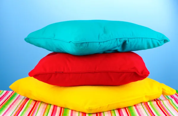Pillows on blue background — Stock Photo, Image