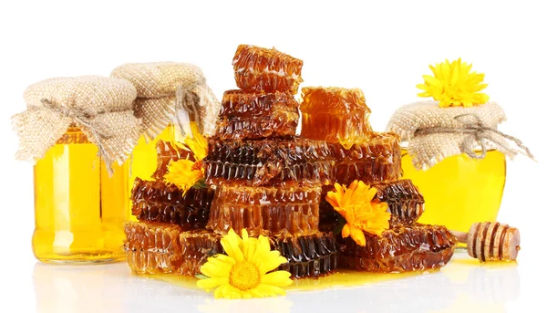 Sweet honeycombs, barrel and jars with honey, isolated on white — Stock Photo, Image