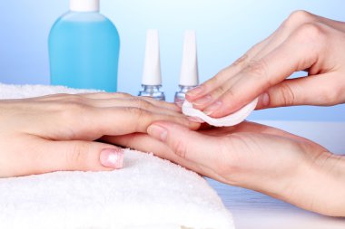 Manicure process in salon clipart