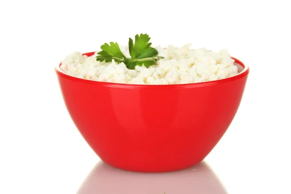 Cottage cheese with parsley in red bowl isolated on white — Stock Photo, Image