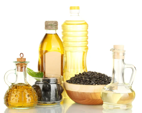 Olivlundar och solrosfält oljan i flaskor och små karaffer isolerad på vit — Stockfoto