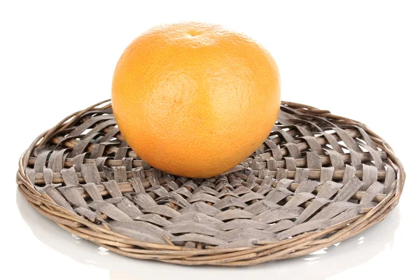 Ripe grapefruit on wicker mat isolated on white — Stock Photo, Image
