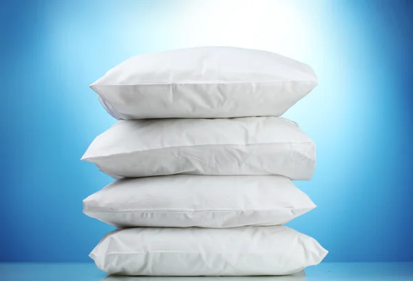 Pillows, on blue background — Stock Photo, Image
