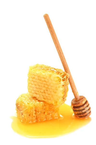 白で隔離される蜂蜜と黄金のハニカム — ストック写真