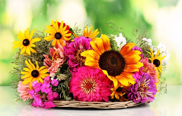 Beautiful bouquet of bright flowers on nature background — Stock Photo, Image