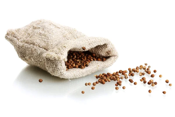 Coriander seeds in sack isolated on white — Stock Photo, Image