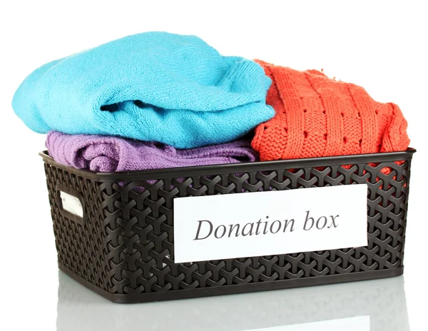 Donation box with clothing isolated on white — Stock Photo, Image