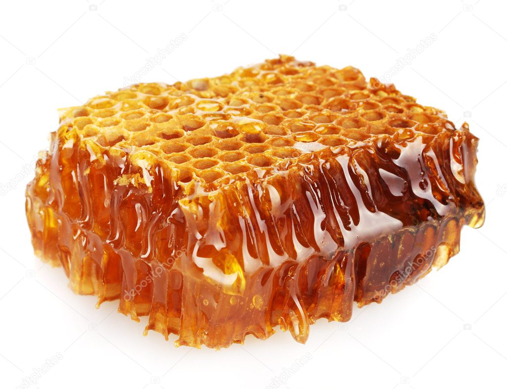 Sweet honeycomb with honey, isolated on white