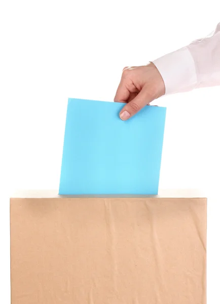 Mão com cédula de voto e caixa isolada em branco — Fotografia de Stock