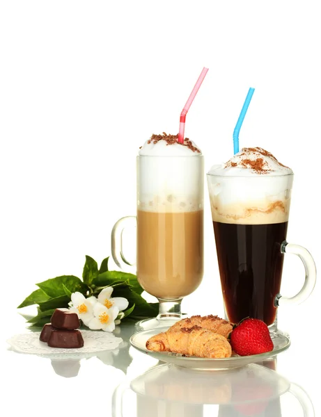 Glasses of coffee cocktail with sweets and flower isolated on white — Stock Photo, Image