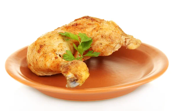 Roasted chicken leg with parsley in the plate isolated on white — Stock Photo, Image