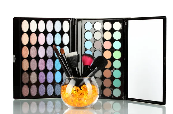 Make-up ecset, egy tál kövekkel palettán árnyékok háttér — Stock Fotó