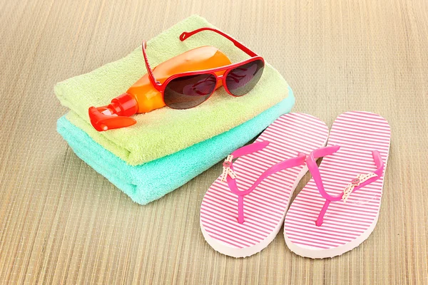 Beach accessories on mat — Stok fotoğraf