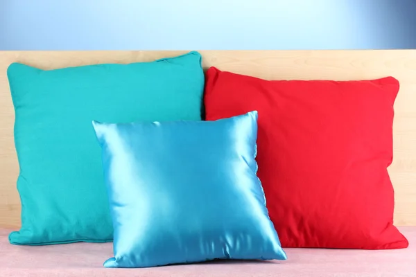 Almohadas sobre fondo azul —  Fotos de Stock