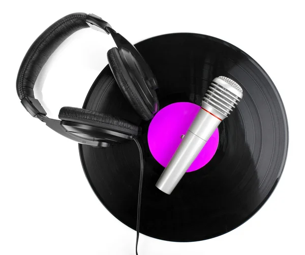 Disque vinyle noir avec écouteurs et microphone isolé sur blanc — Photo