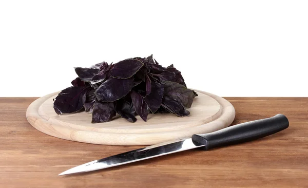 La albahaca en la tabla de cortar por el cuchillo — Foto de Stock