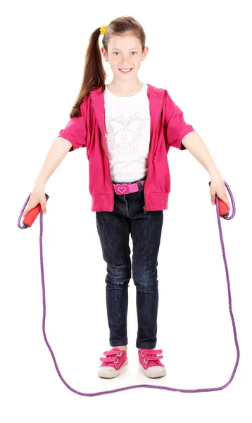 Hermosa niña en ropa deportiva con saltar la cuerda aislada en blanco —  Fotos de Stock