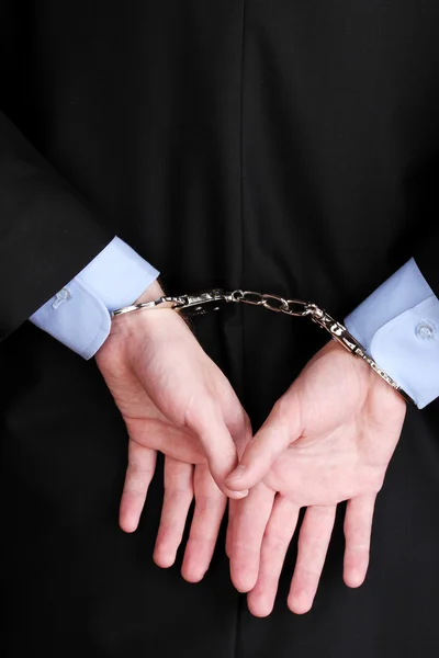 Businessman hands fettered with handcuffs — Stock Photo, Image