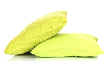 Bright color pillows isolated on white