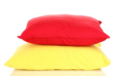 Bright color pillows isolated on white