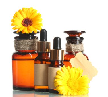 Medicine bottles and beautiful calendula flowers, isolated on white clipart