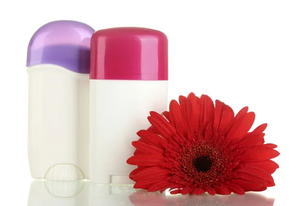 Desodorizantes com flor isolada em branco — Fotografia de Stock