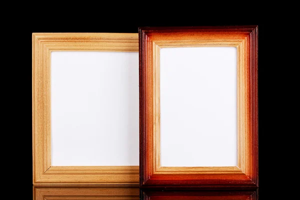 Wooden frames isolated on black — Stock Photo, Image