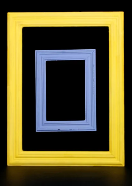 Wooden frames isolated on black — Stock Photo, Image