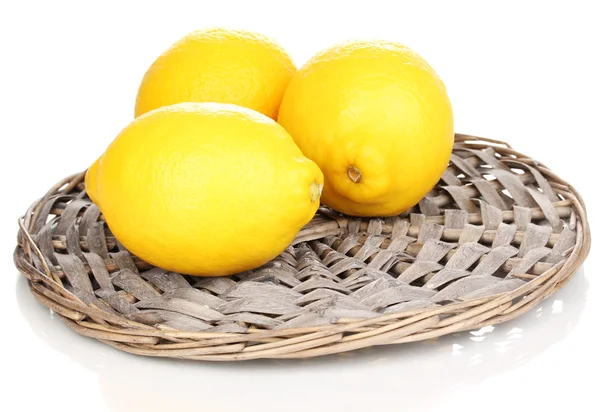 Limões em uma tábua isolada em branco — Fotografia de Stock