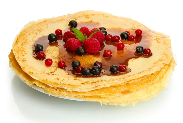Delicious pancakes with berries and chocolate on plate isolated on white — Stock Photo, Image