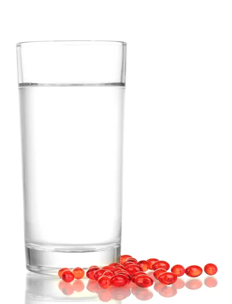 水と白いクローズ アップに分離された錠剤のガラス — ストック写真