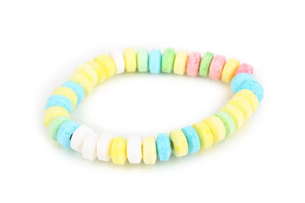 Bonbons de couleur sur corde isolé sur blanc — Photo