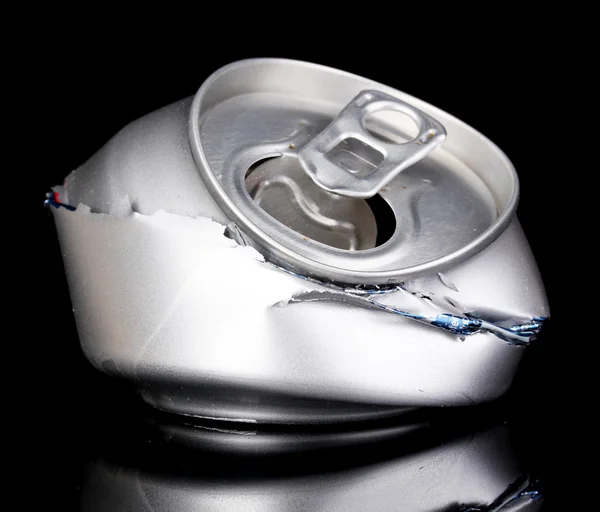 Crumpled empty can isolated on black — Stock Photo, Image