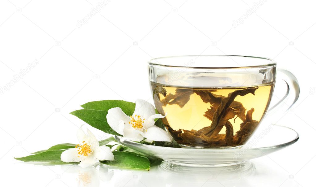 Cup of green tea with jasmine flowers isolated on white