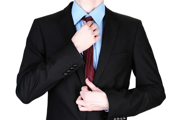 Businessman correcting a tie close up — Stock Photo, Image