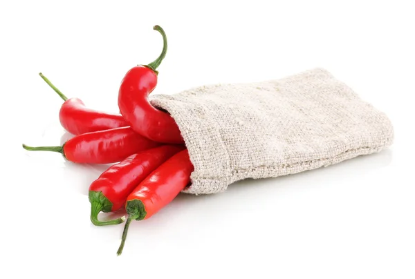 Red hot chili peppers in bag isolated on white — Stock Photo, Image