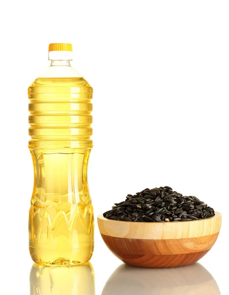 Соняшникова олія з насінням соняшнику ізольовані на білому тлі — стокове фото