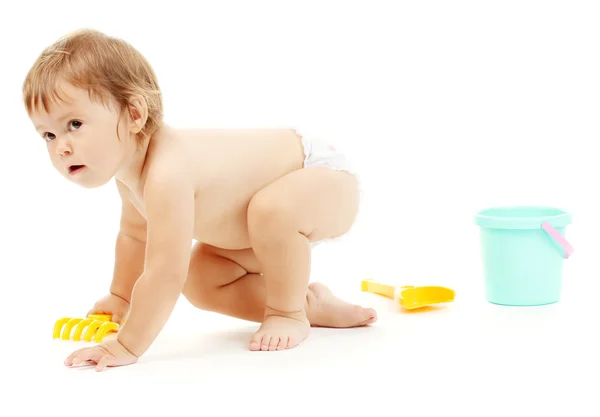 stock image Cute baby with bucket and spade isolated on white