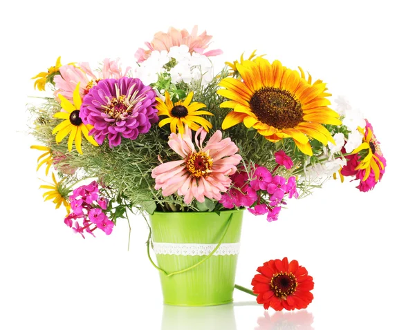 Beautiful bouquet of bright flowers in pail isolated on white — Stock Photo, Image