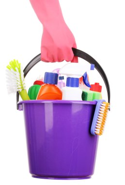 Bucket with cleaning items in hand isolated on white clipart