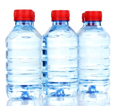 Plastic bottles of water isolated on white