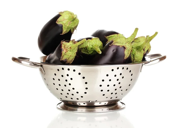 Fresh eggplants in colander isolated on white — Stock Photo, Image