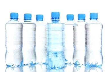 Plastic bottles of water isolated on white