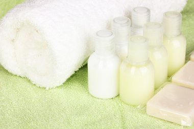 Hotel amenities kit on towel clipart