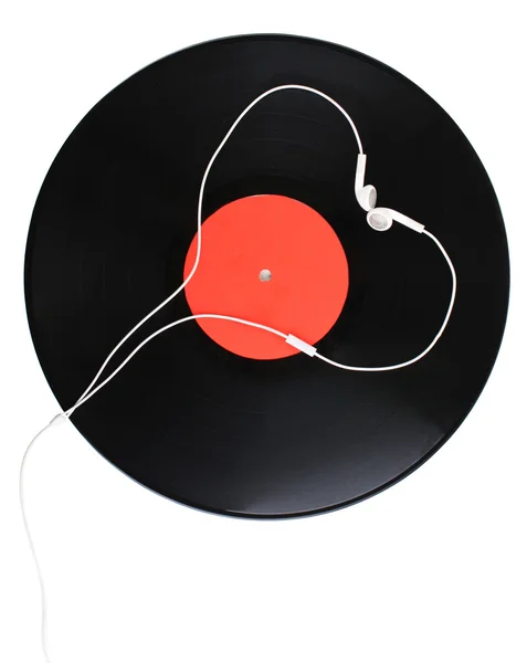 Grabación de vinilo negro y auriculares aislados en blanco — Foto de Stock