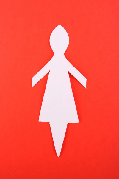Kağıt kadın kırmızı zemin üzerine — Stok fotoğraf