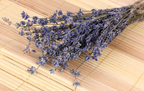 Lavender flowers on bamboo mat — Stock Photo, Image
