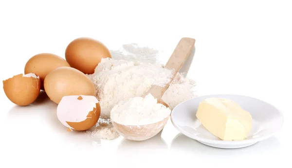 Eggs, flour and butter isolated on white — Stock Photo, Image