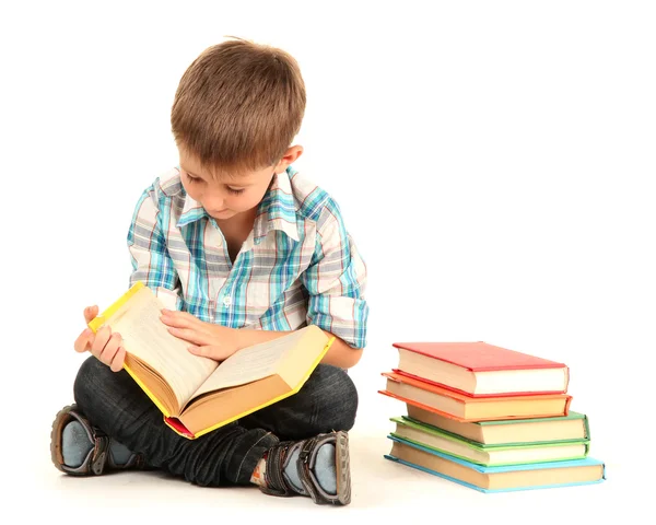 Grappige kleine jongen met boeken geïsoleerd op wit — Stockfoto