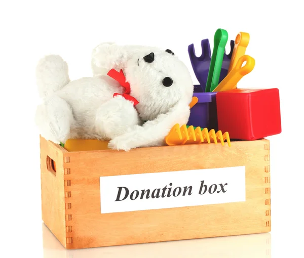 Caixa de doação com brinquedos infantis isolados em branco — Fotografia de Stock